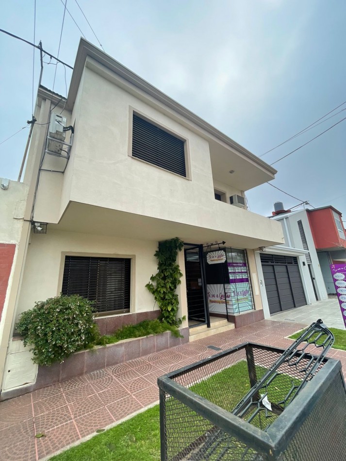 Casa al frente de categoria